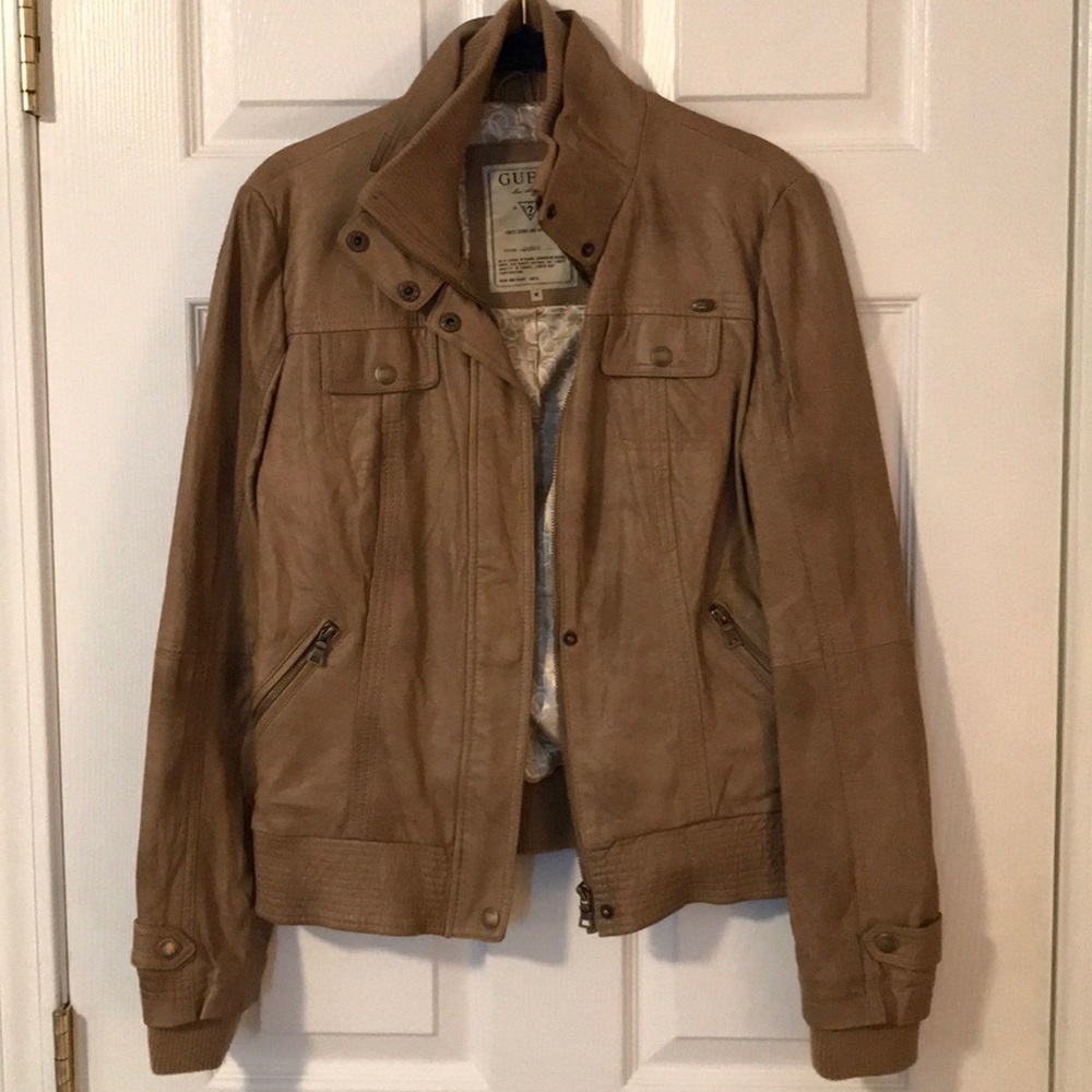 Tan leather motorcycle jacket.